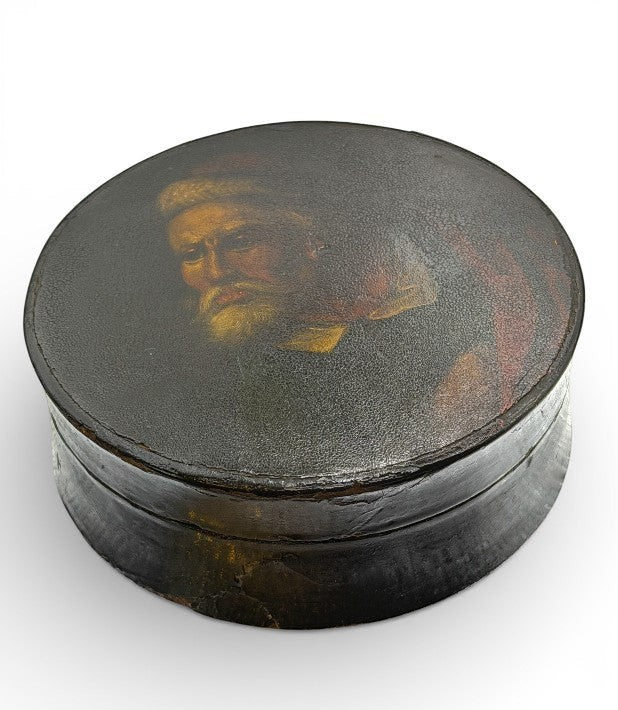 Hinson Vintage Interiors antique round black lacquer snuff box with a hand-painted gentleman portrait on the lid.