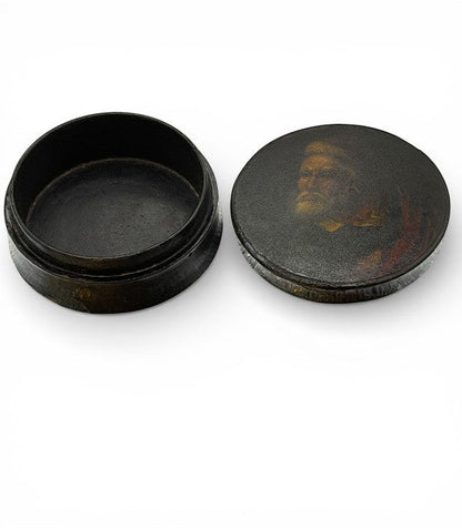 Hinson Vintage Interiors antique round black lacquer snuff box with a hand-painted gentleman portrait on the lid.