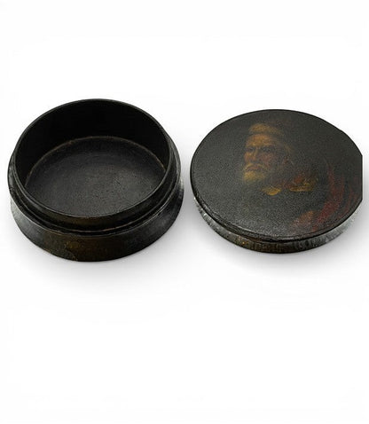Hinson Vintage Interiors antique round black lacquer snuff box with a hand-painted gentleman portrait on the lid.