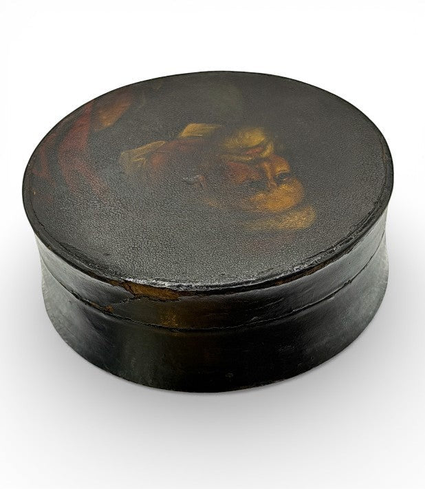 Hinson Vintage Interiors antique round black lacquer snuff box with a hand-painted gentleman portrait on the lid.