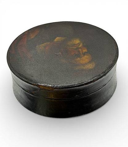 Hinson Vintage Interiors antique round black lacquer snuff box with a hand-painted gentleman portrait on the lid.