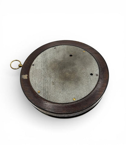 Hinson Vintage Interiors vintage Italian aneroid barometer showing the dark wood back case and brass hanging ring.
