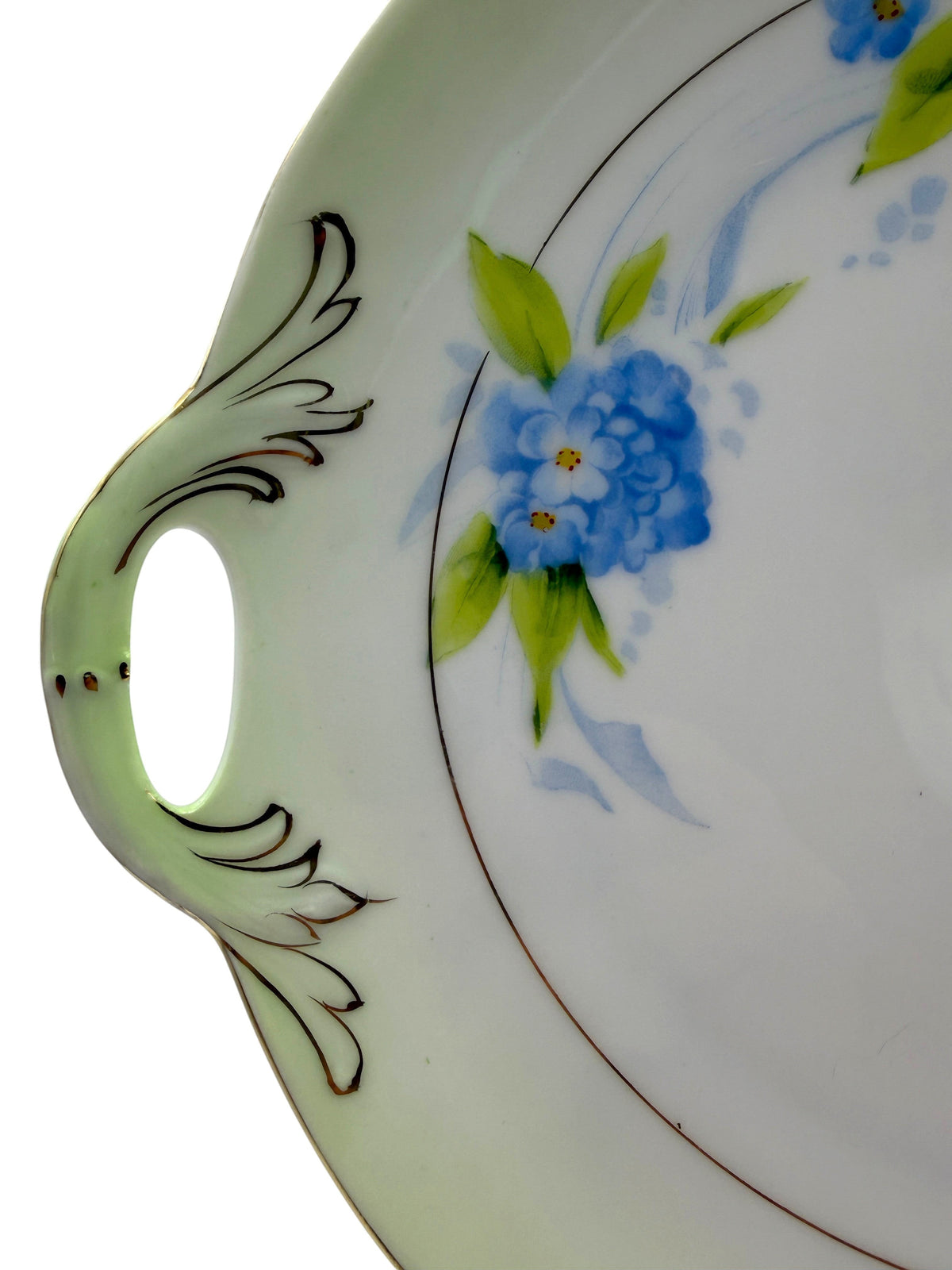 Hinson Vintage Interiors Bavaria Rosch porcelain cake plate with blue floral pattern, gold trim, and ornate handles.