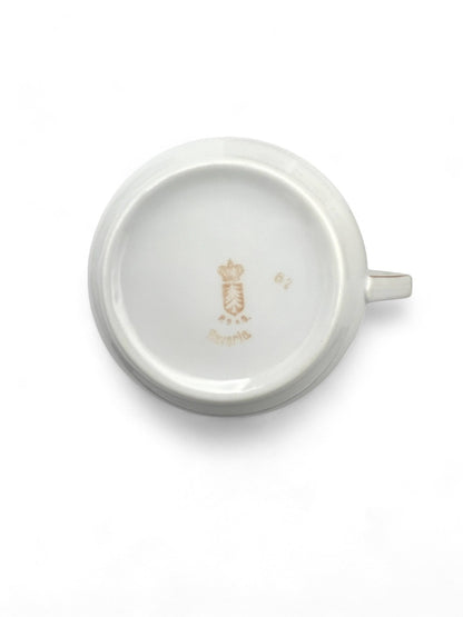 Hinson Vintage Interiors porcelain tea cup base showing the gold Bavarian maker mark on a white surface