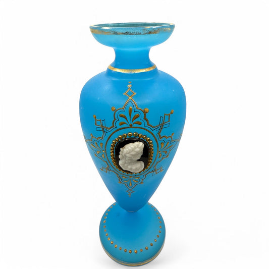 Hinson Vintage Interiors blue opaline glass vase featuring an applied white cameo portrait and intricate gold trim.