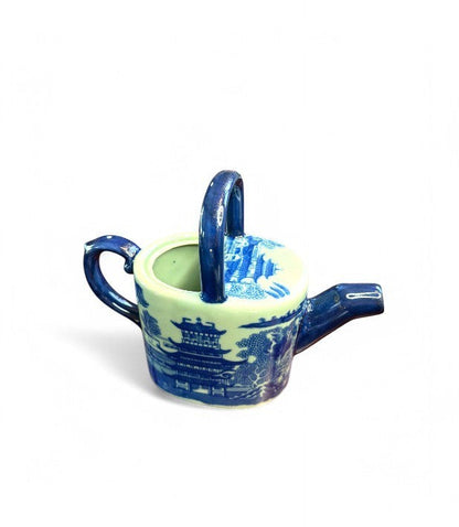 Hinson Vintage Interiors blue and white ironstone teapot featuring a classic Willow-style pastoral transferware pattern.