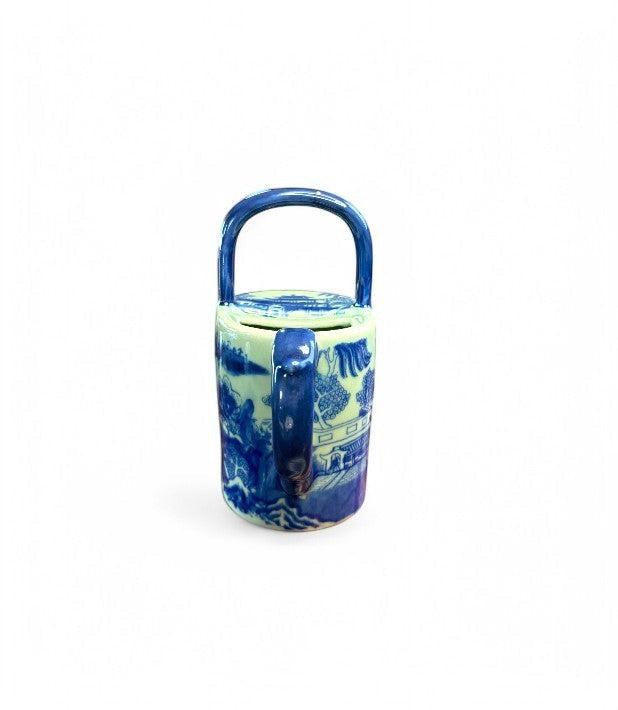 Hinson Vintage Interiors blue and white ironstone teapot featuring a classic Willow pattern and arched handle