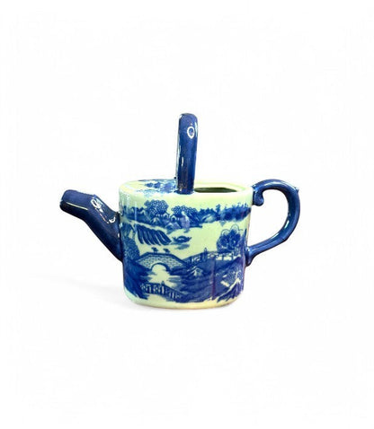 Hinson Vintage Interiors blue and white ironstone teapot featuring a classic Willow-style pastoral transferware pattern.
