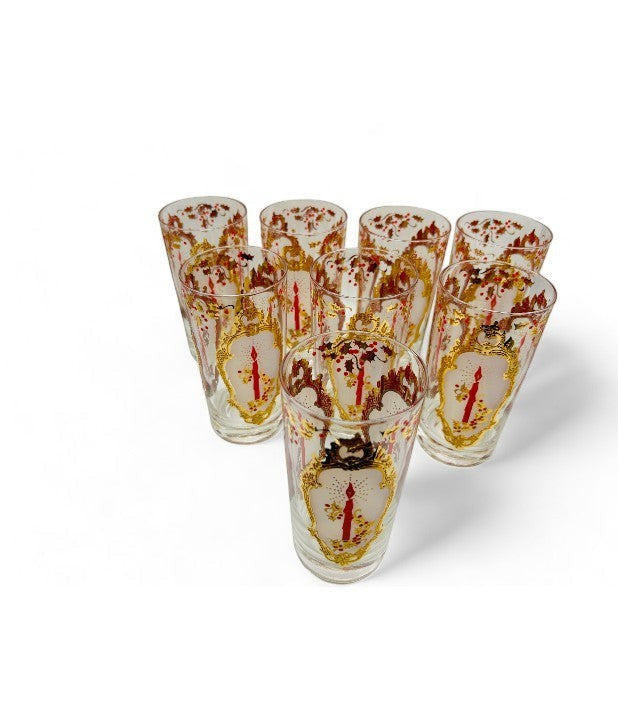 Hinson Vintage Interiors set of eight Culver Christmas drinking glasses with gold trim and red candle motifs.