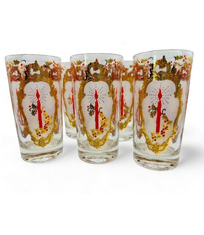 Hinson Vintage Interiors set of eight Culver Christmas drinking glasses with gold trim, red candles, and holly.