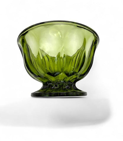 Hinson Vintage Interiors emerald green Anchor Hocking Fairfield pedestal bowl with scalloped rim and pressed glass.