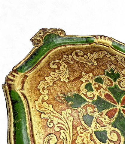 Hinson Vintage Interiors vintage Florentine gilt wood tray with ornate gold, green, and red scrollwork details.
