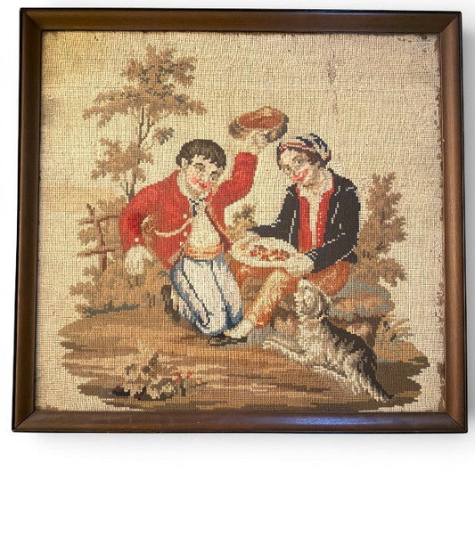 Hinson Vintage Interiors framed needlepoint art featuring a romantic courting scene with a dog in a wooden frame.
