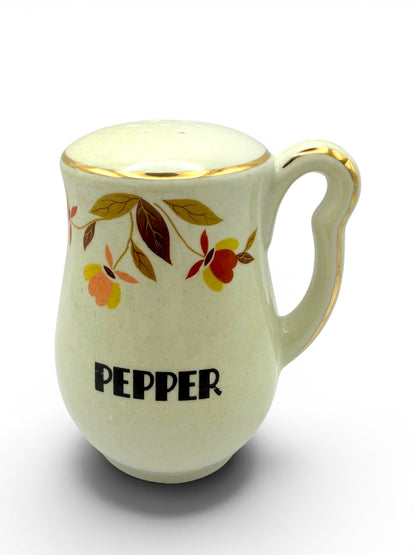 Hinson Vintage Interiors Hall China Autumn Leaf ceramic pepper shaker with gold trim and colorful floral pattern