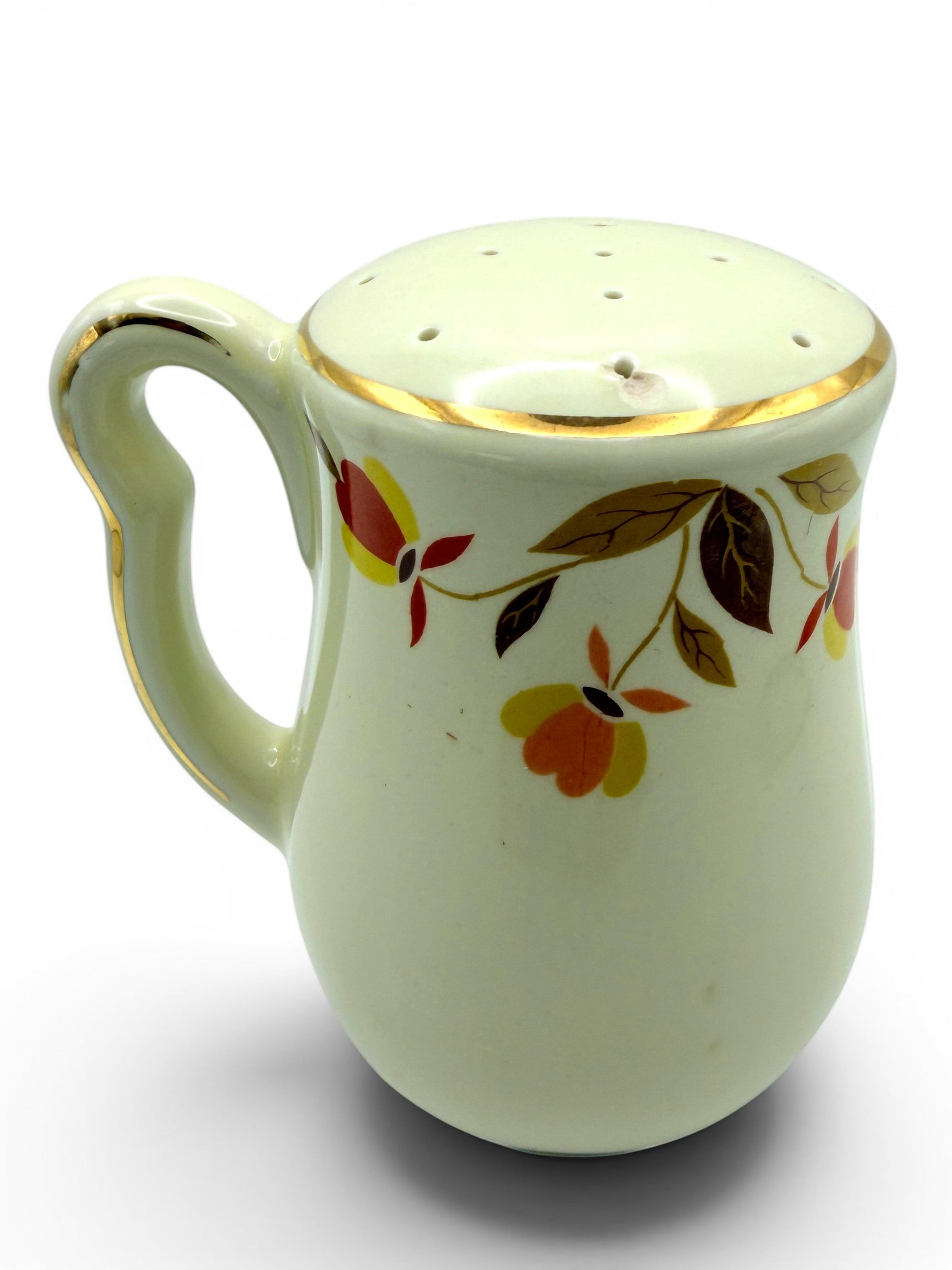 Hinson Vintage Interiors Hall China ceramic salt and pepper shaker with Autumn Leaf pattern and gold trim