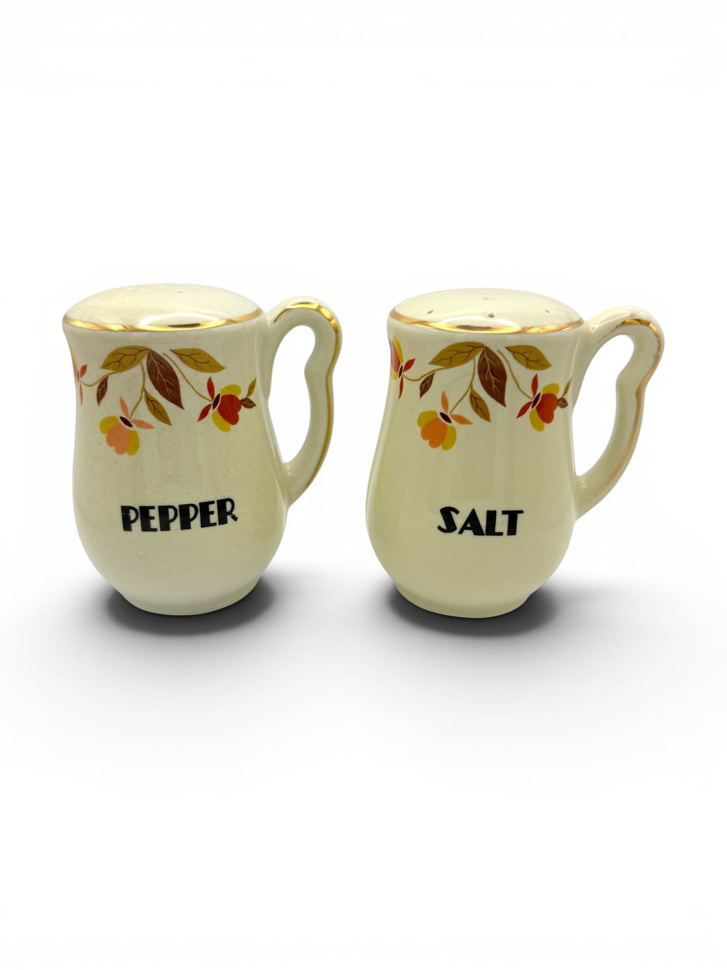 Hinson Vintage Interiors Hall China Autumn Leaf ceramic salt and pepper shakers with gold trim and floral pattern
