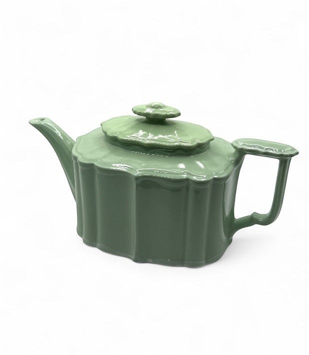 Hinson Vintage Interiors vintage Hall Benjamin ceramic teapot in a glossy celadon green with Art Deco scalloped edges.