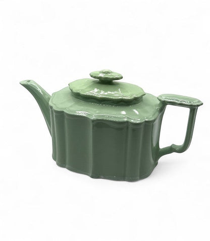 Hinson Vintage Interiors vintage Hall Benjamin ceramic teapot in a glossy celadon green with Art Deco scalloped edges.