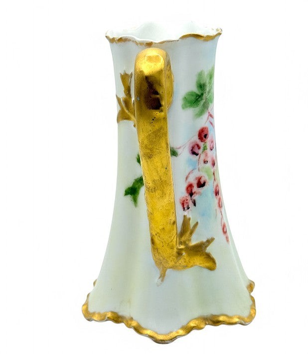 Hinson Vintage Interiors antique Haviland France porcelain pitcher with hand-painted pink berries and gold trim.