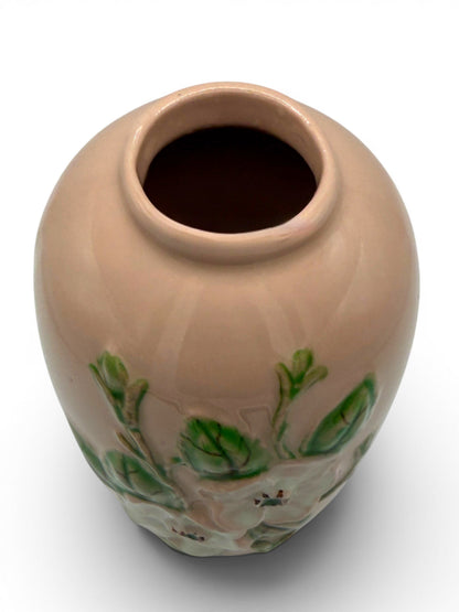 Hinson Vintage Interiors Hull Pottery vase in blush pink with raised white floral and green leaf relief detail