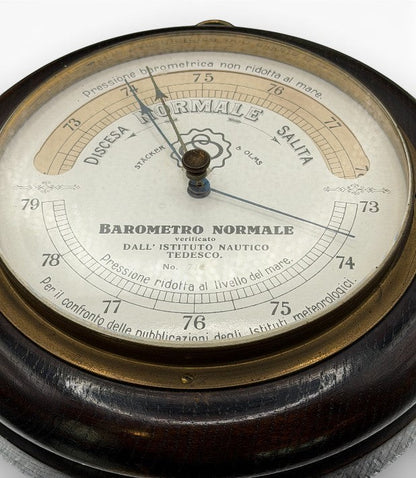 Hinson Vintage Interiors vintage Italian Barometro Normale aneroid barometer with dark wood case and brass bezel.