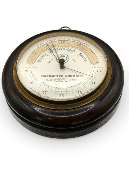 Hinson Vintage Interiors vintage Italian aneroid barometer with a dark wood case and brass bezel, 7-inch diameter.