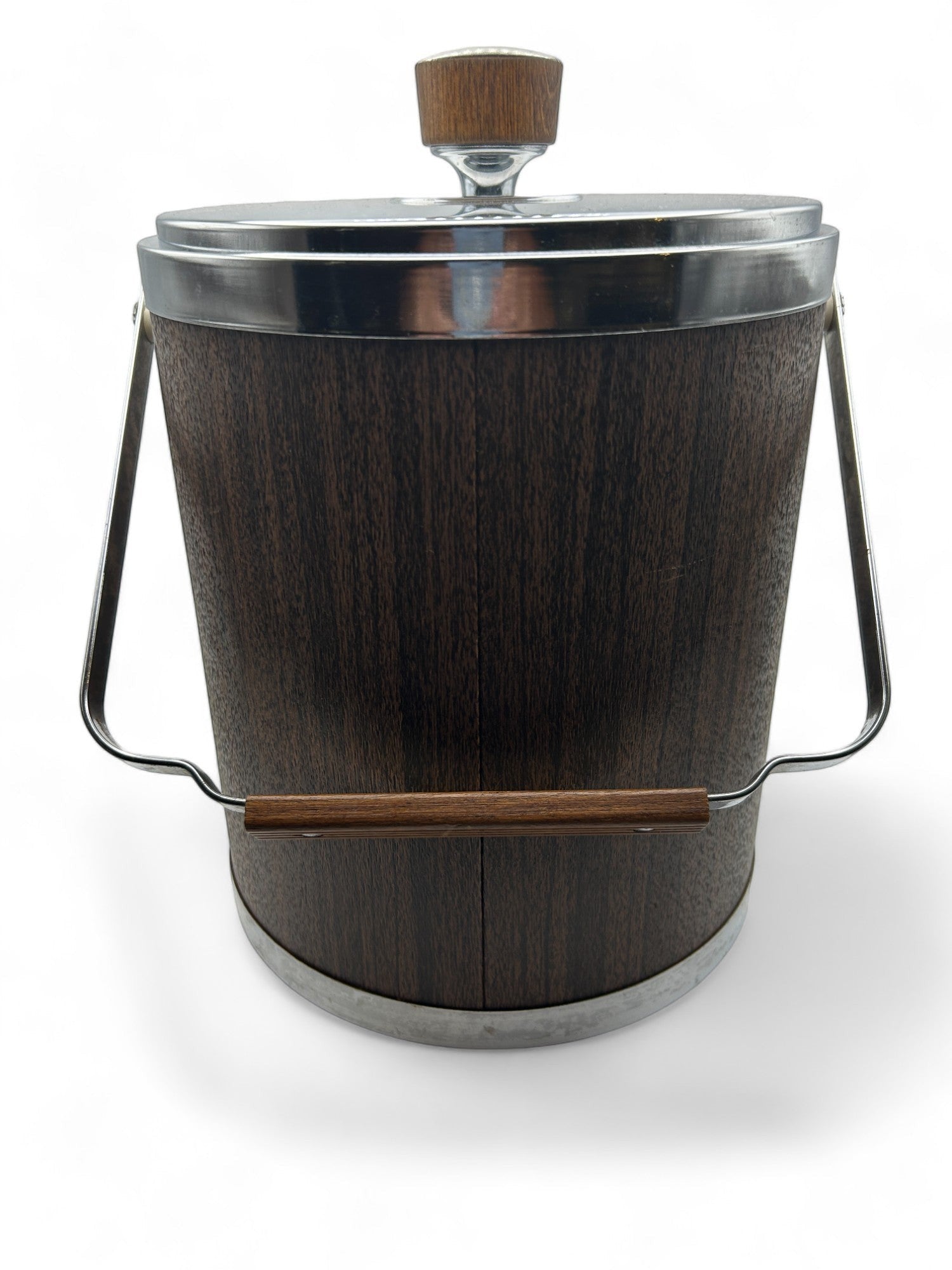 Hinson Vintage Interiors mid-century Kromex ice bucket with faux wood finish, chrome accents, and a sturdy handle.