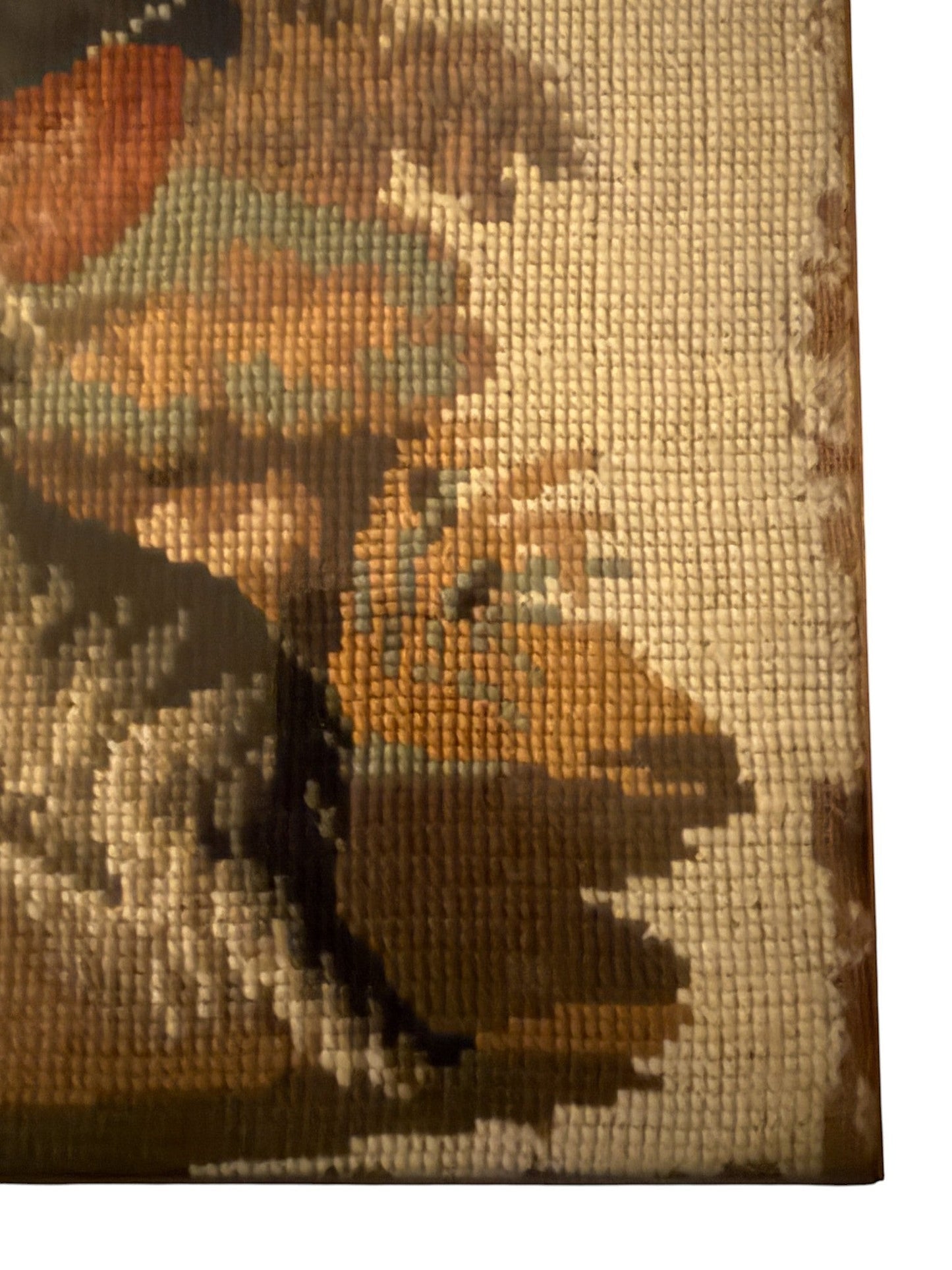 Hinson Vintage Interiors vintage needlepoint detail featuring a romantic courting scene with a dog in muted tones.