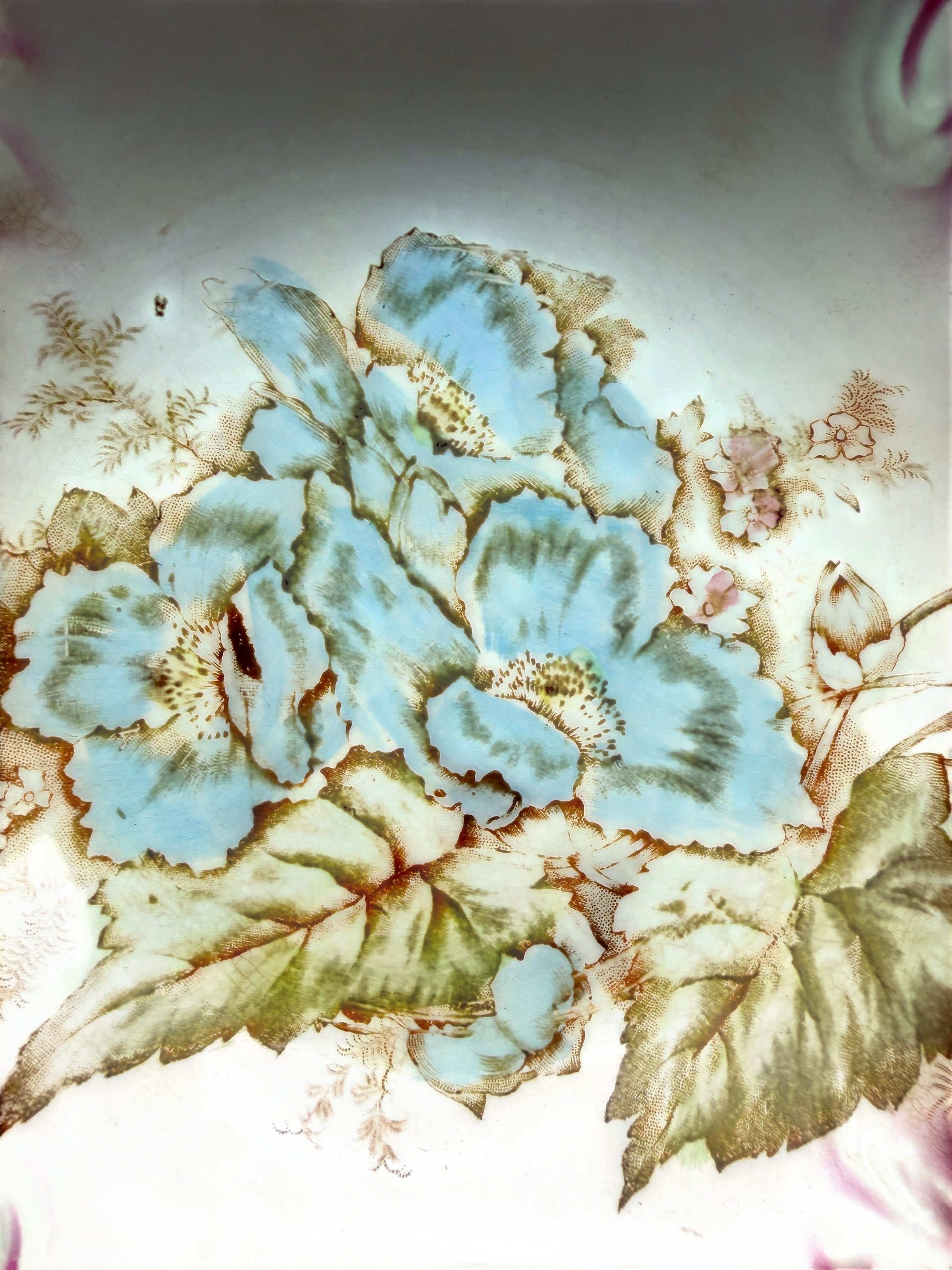 Hinson Vintage Interiors antique La Francaise porcelain bowl featuring a detailed blue floral center and pink shading.