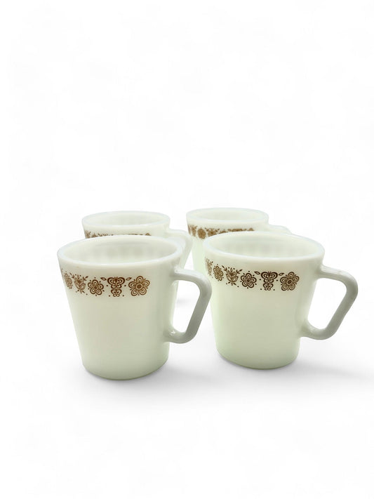 Hinson Vintage Interiors set of four white Pyrex glass coffee cups with 1970s butterfly gold floral pattern
