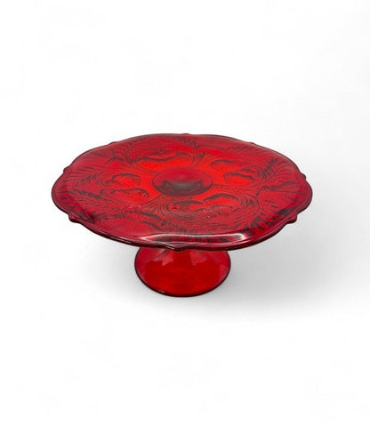 Hinson Vintage Interiors ruby red pressed glass cake stand with Inverted Thistle floral pattern and pedestal base.