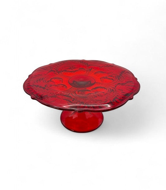 Hinson Vintage Interiors ruby red pressed glass cake stand with Inverted Thistle floral pattern and pedestal base.