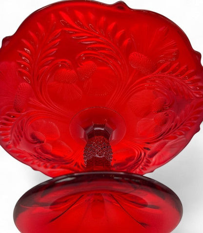 Hinson Vintage Interiors ruby red pressed glass cake stand featuring the intricate Inverted Thistle floral pattern.