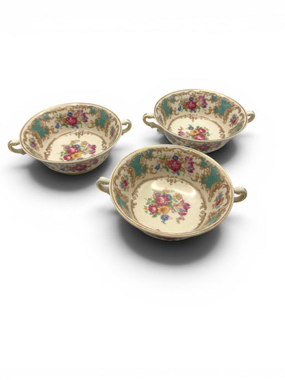 Hinson Vintage Interiors set of three Syracuse China Romance Green cream soup bowls with floral patterns and gold trim.