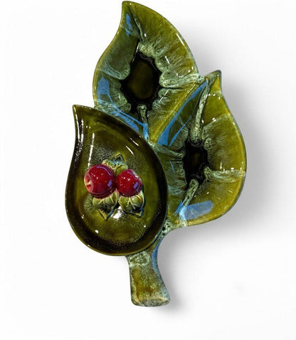 Hinson Vintage Interiors 1960s Wade of California ceramic leaf dish in avocado green with drip glaze and red berries.