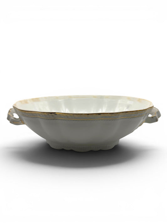 Hinson Vintage Interiors white porcelain serving bowl with gold trim, ribbed detailing, and scalloped handles.