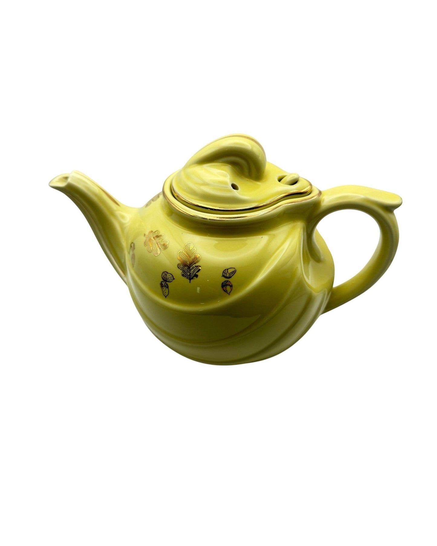 Hinson Vintage Interiors yellow ceramic Hall 6-cup teapot with gold autumn leaf and acorn motif and gold trim.